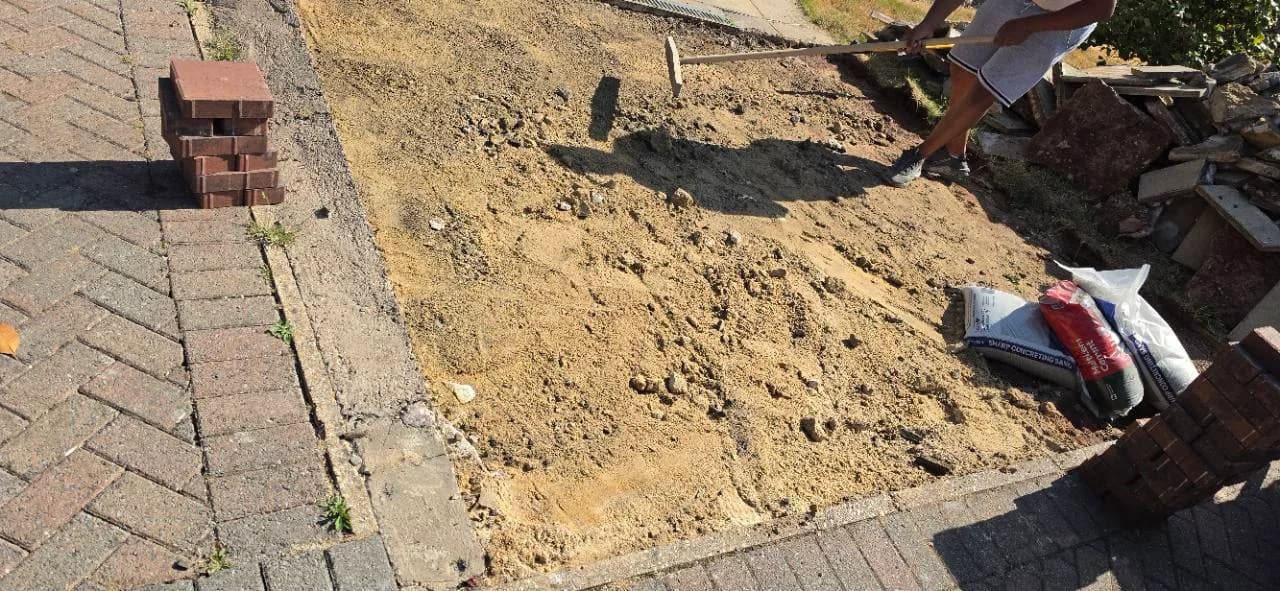 Highbridge driveway excavated after the old concrete slabs were removed for resin preparation