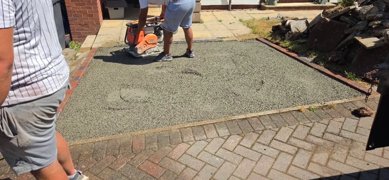Permeable concrete base being compacted for a Canyon Stone resin driveway in Highbridge