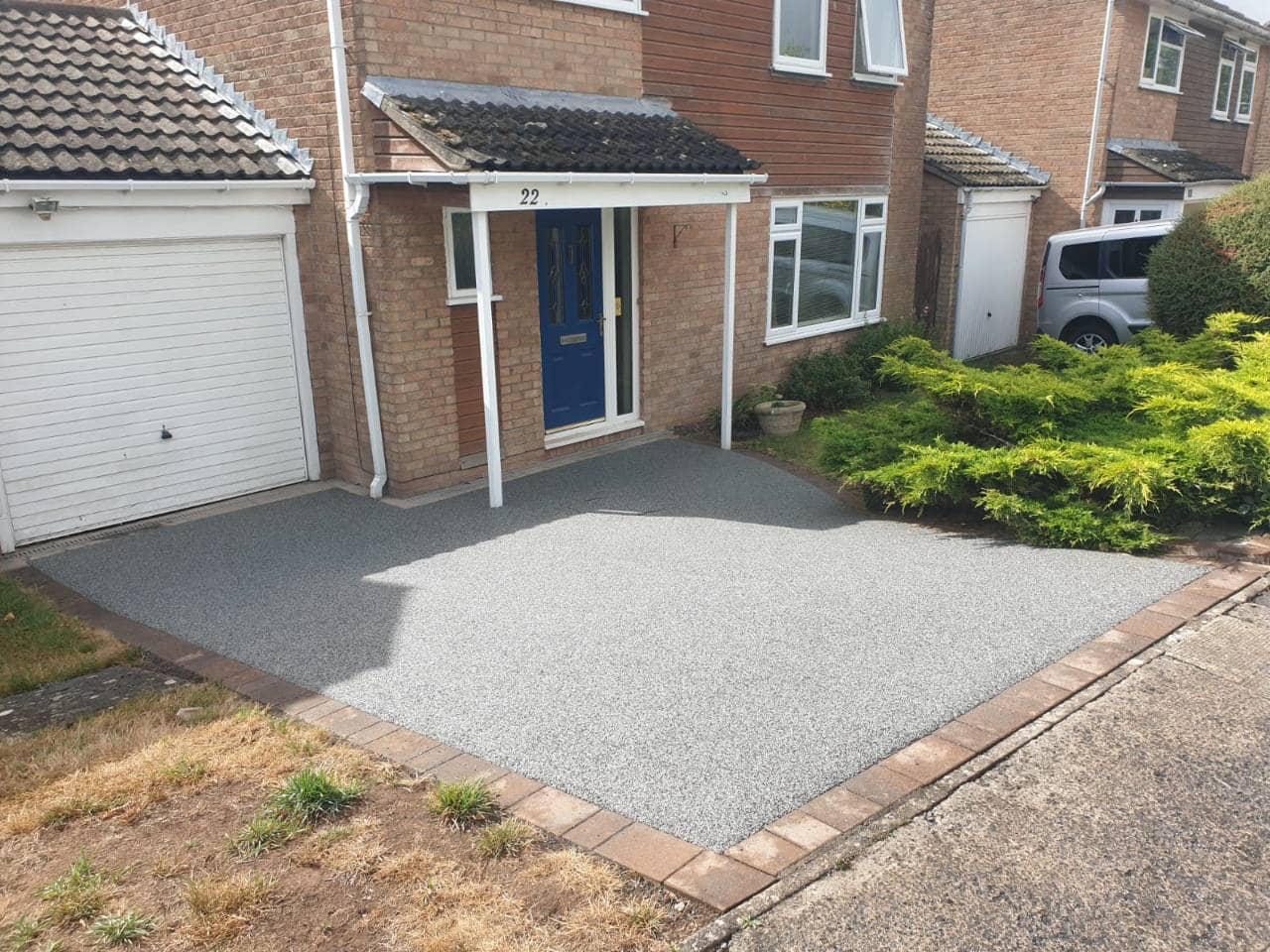 After photo of a completed Vesuvian resin bound driveway with block edging in Portishead installed by Quantock Paving