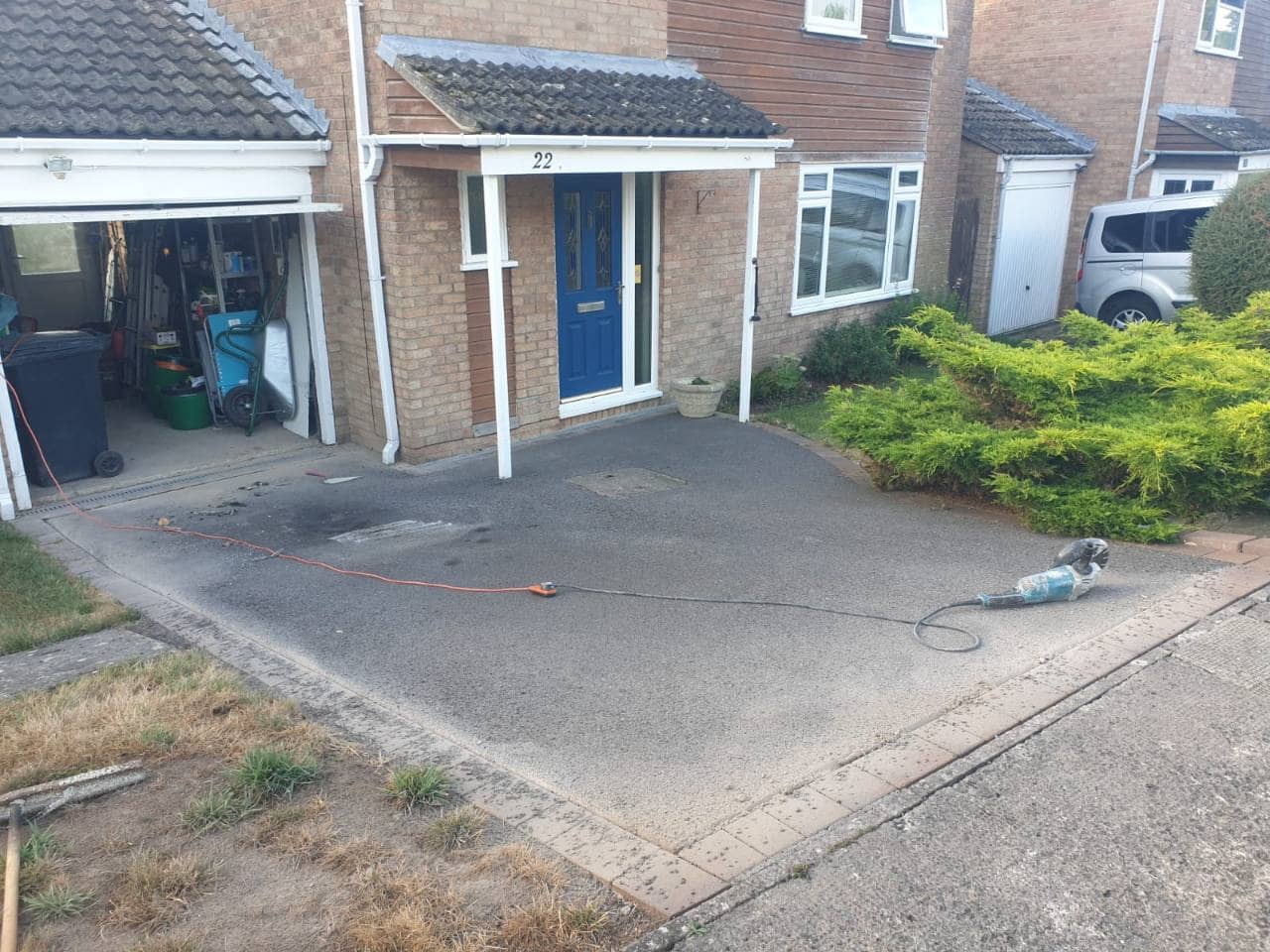 Before photo of a prepared driveway frontage in Portishead before Vesuvian resin bound surfacing