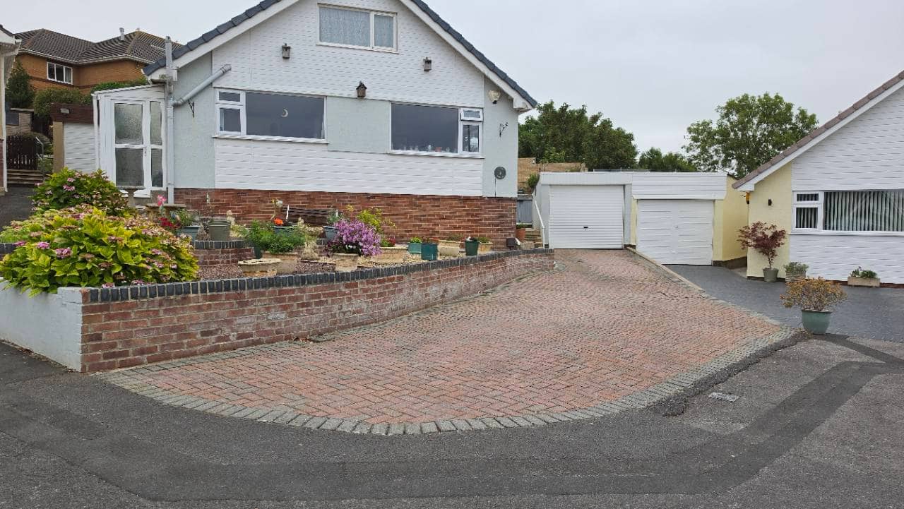 Before photo of a weathered block-paved driveway in Weston-super-Mare before New Palazzo resin bound surfacing