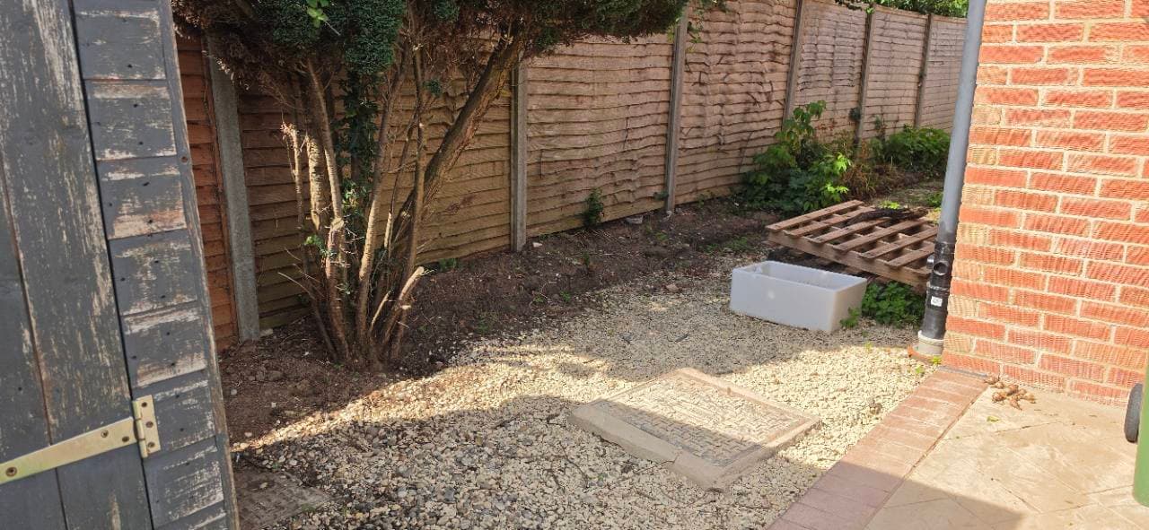 Original gravel garden area before the Bridgwater Canyon Stone resin patio extension