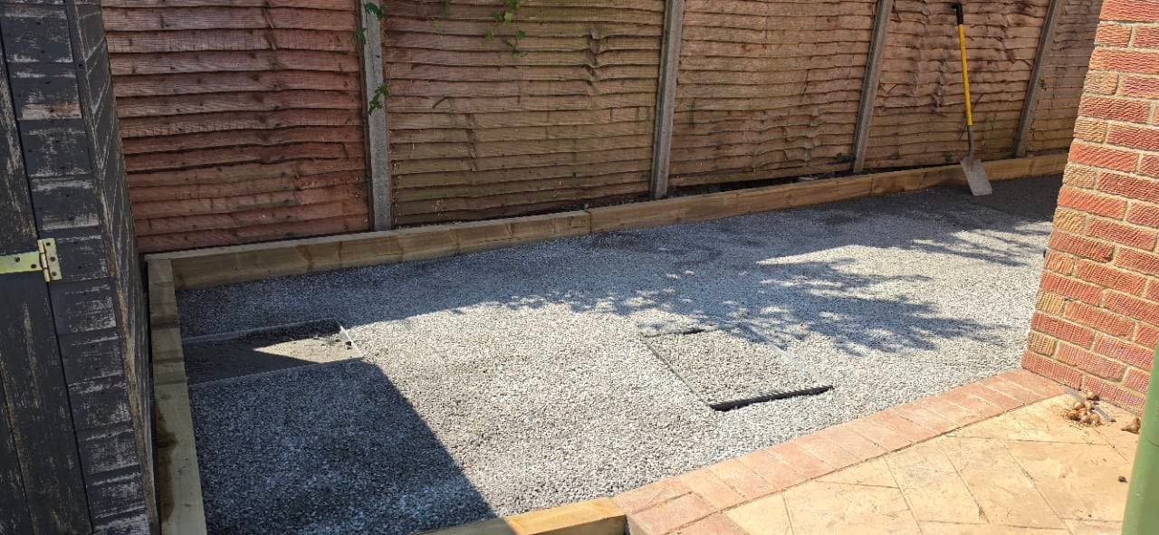 Concrete base completed around the service covers on the Bridgwater resin patio project