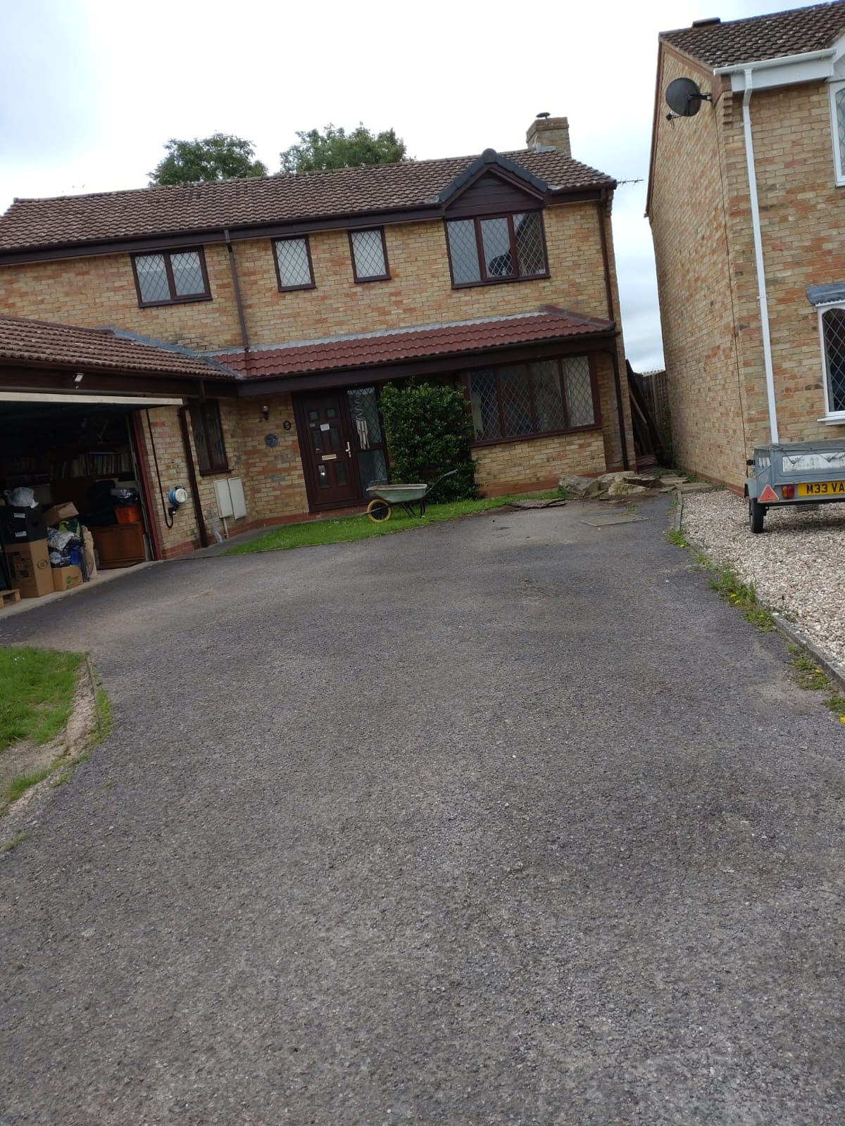 Original tarmac driveway before block paving work started in Bristol