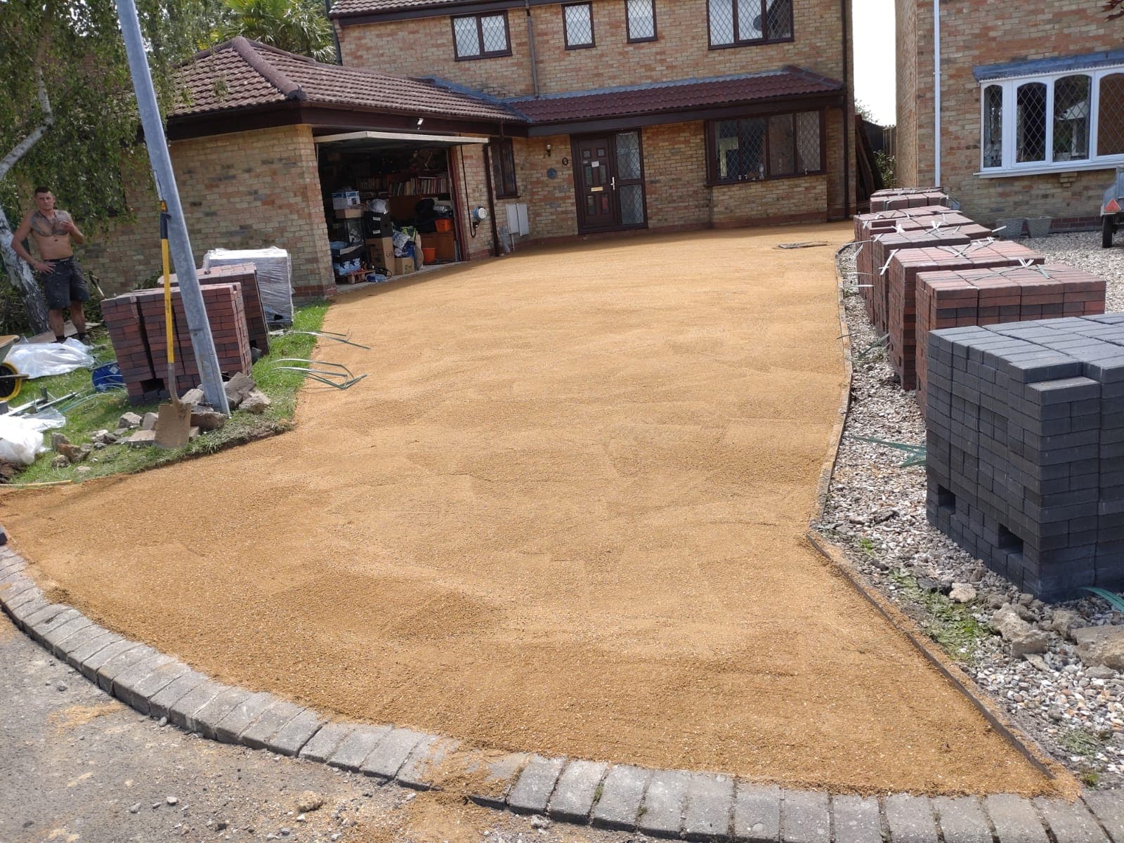 MOT Type 1 base and sharp sand screed preparation for Bristol block paving driveway