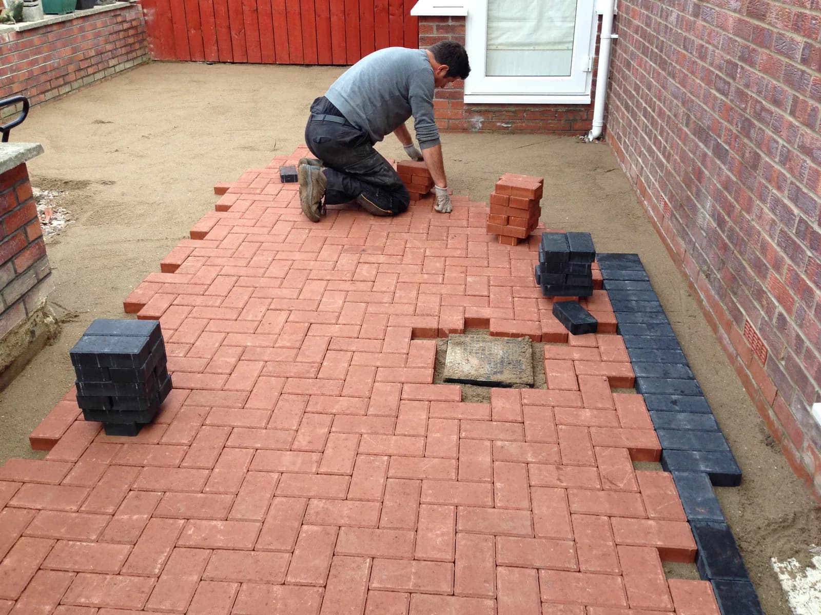 Brindle block paviors being laid beside the house in Burnham-on-Sea