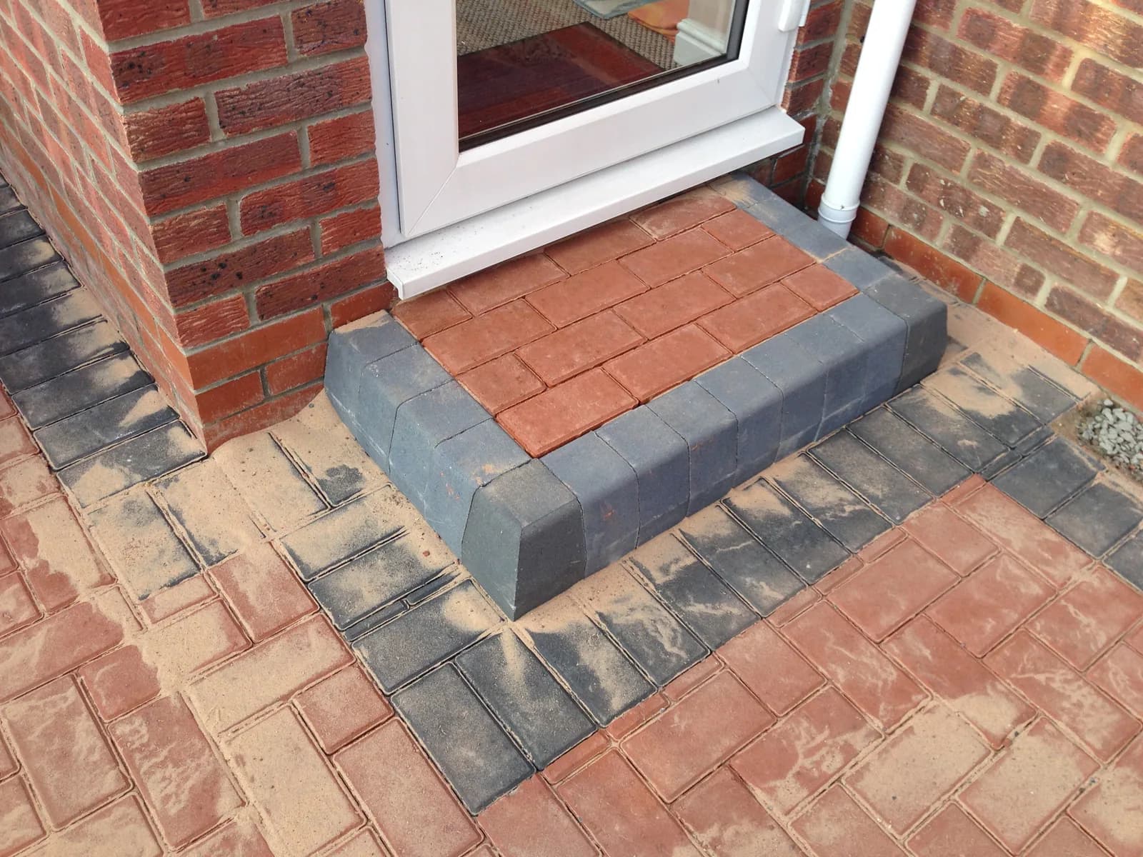 Block paving patio and raised steps in progress in Burnham-on-Sea
