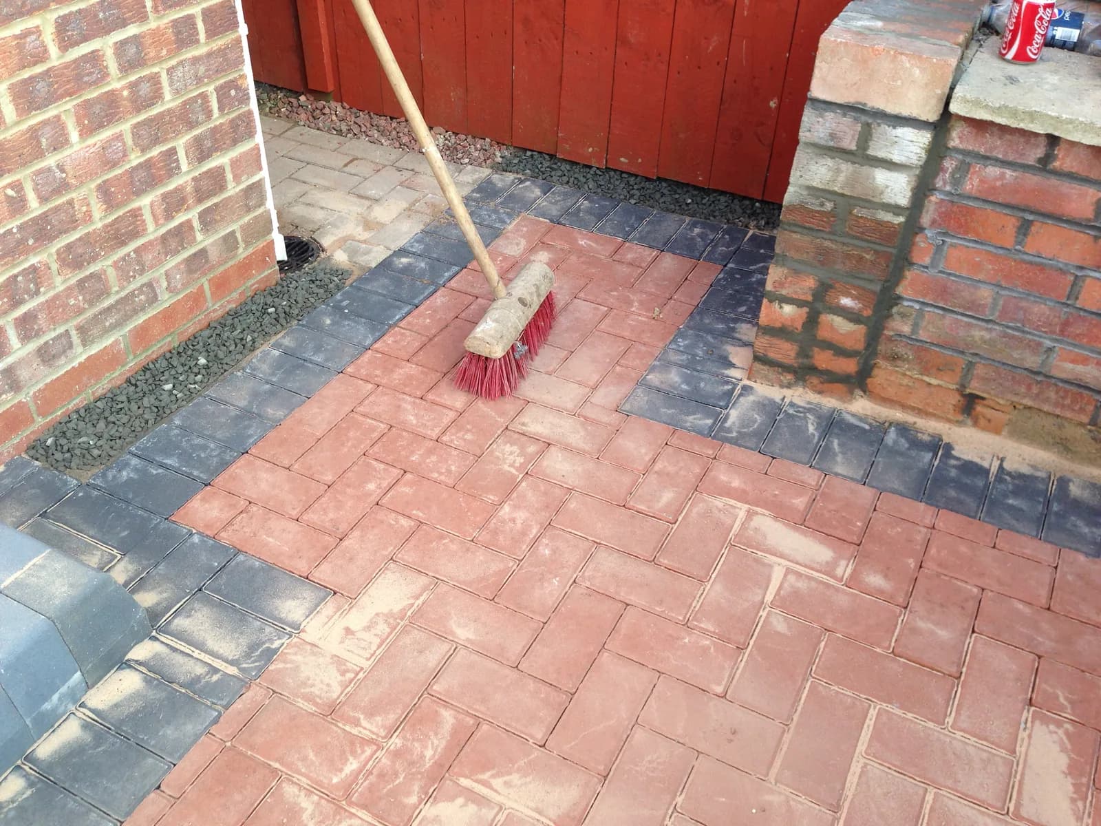 Block paving joints being swept on the finished Burnham-on-Sea patio