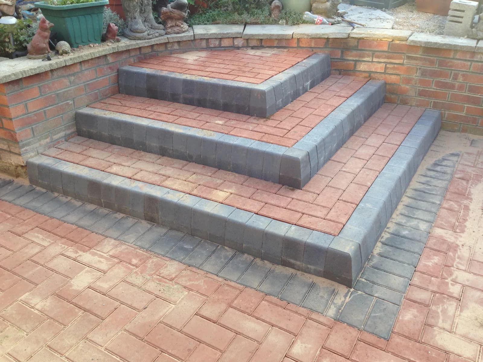 Finished raised patio steps with charcoal block border in Burnham-on-Sea