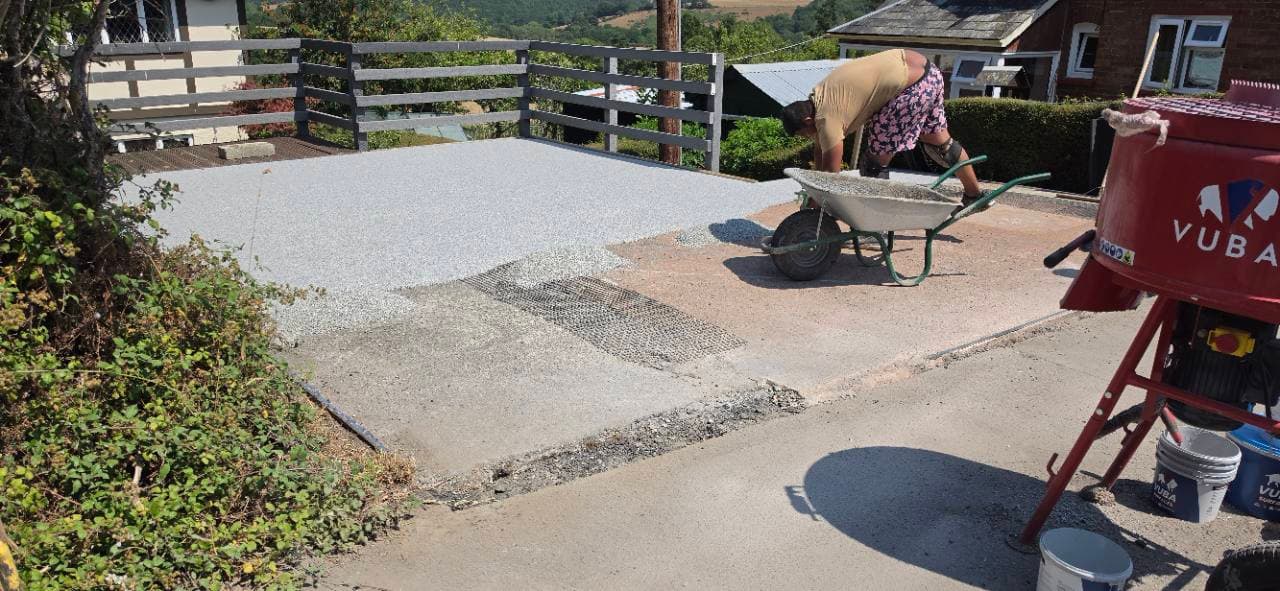 Vuba Poseidon resin bound aggregate being laid on the prepared Exeter driveway