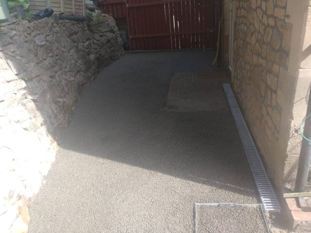 Channel drainage and prepared base beside the Weston-super-Mare property