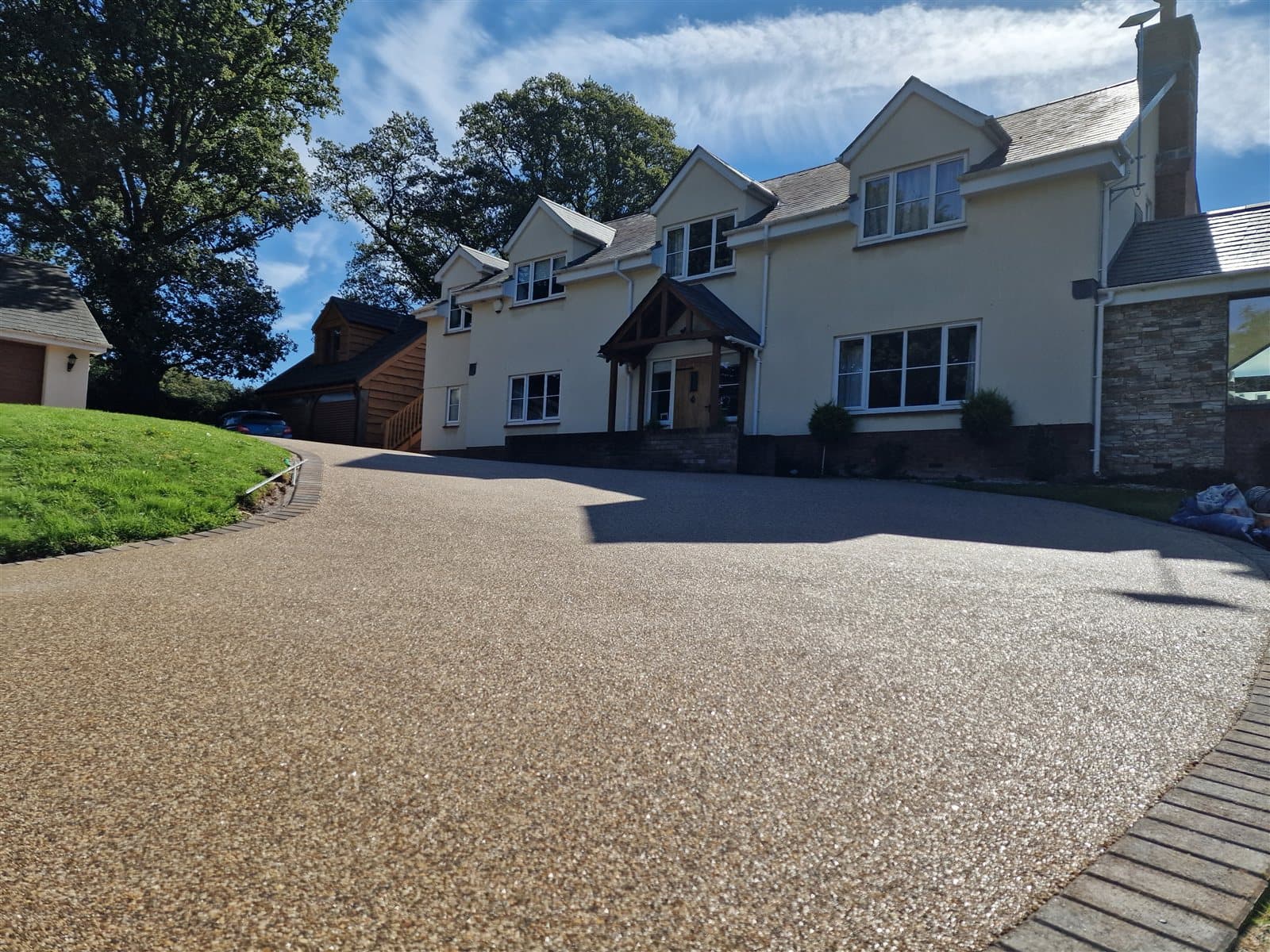 Golden resin bound driveway to a period farmhouse