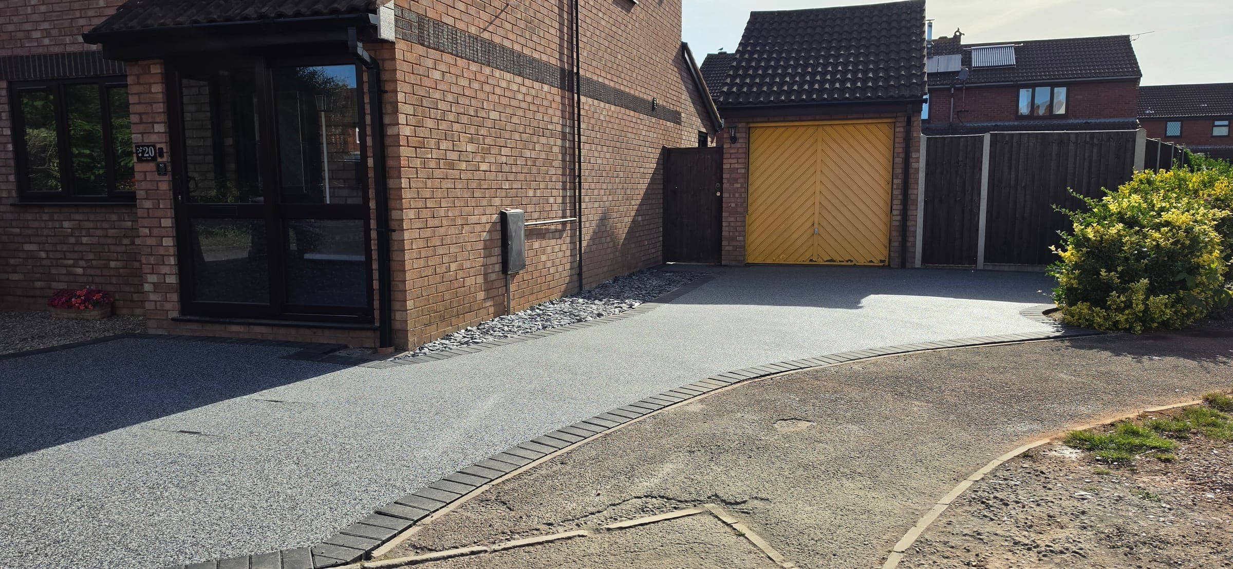 New Palazzo resin driveway with charcoal block border, Taunton