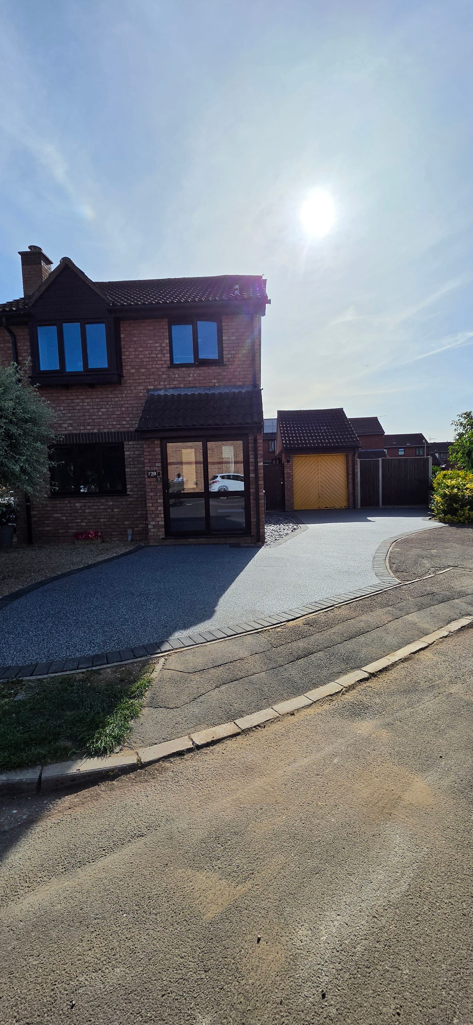 New Palazzo resin driveway with charcoal block border, Taunton
