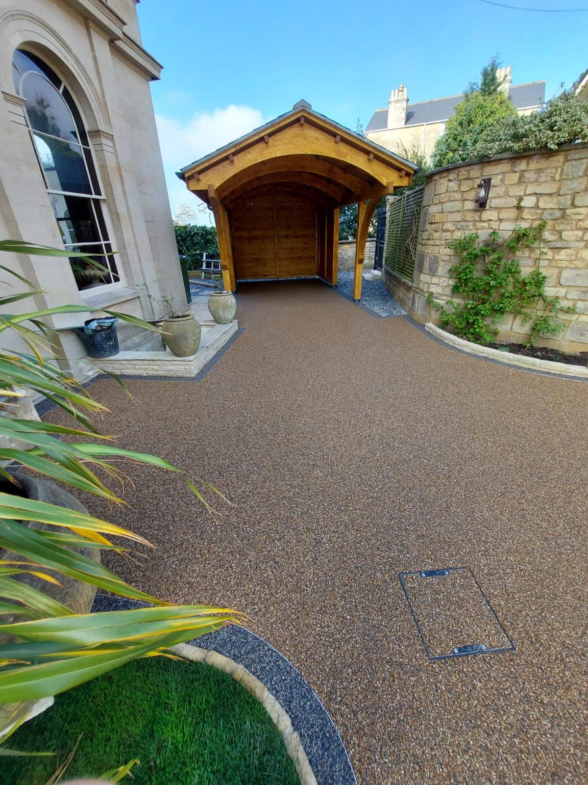 Resin bound path and parking to an oak carport
