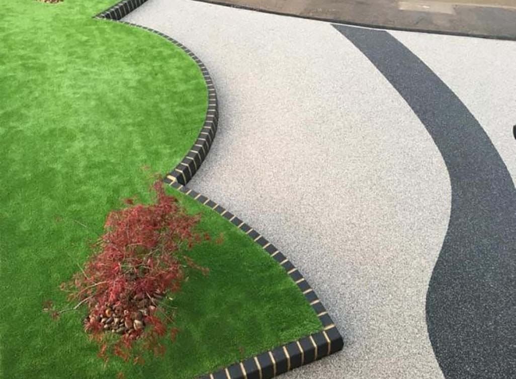 Silver resin with charcoal feature sweep and lawn edging